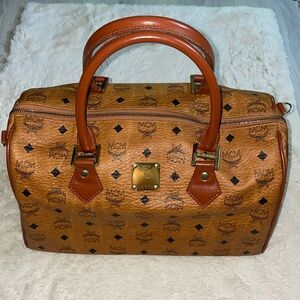 Authentic MCM Boston bag preowned. Tan color